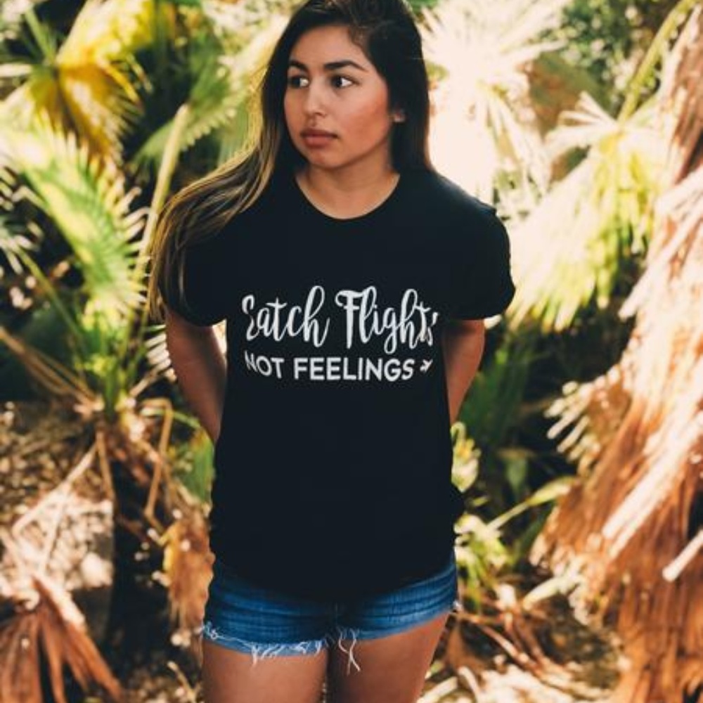 CATCH FLIGHTS NOT FEELINGS TEE